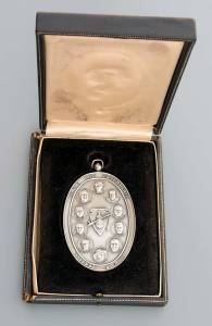 The 7 ½ troy ounce, 4 inch overall solid silver medal was designed by Loretta Griffin and struck by The Metallic Art Company. This one is #299 of an edition of 400. It was also produced in an unnumbered edition of pewter.   Click to enlarge.